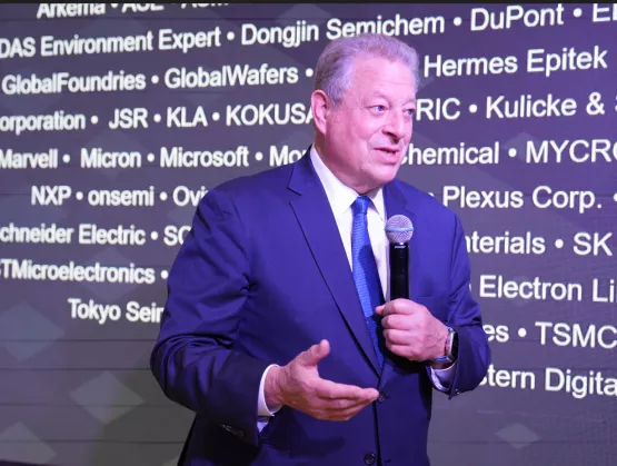 Al Gore speaking in front of SCC member names
