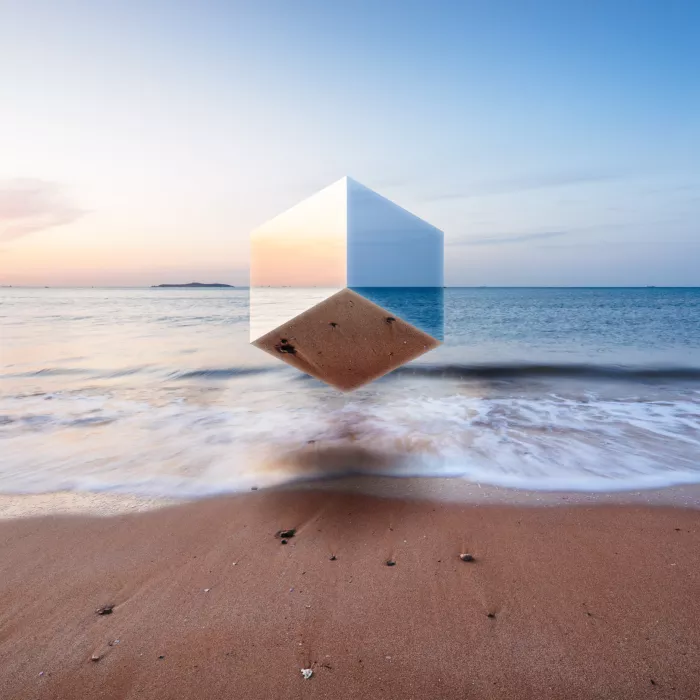 reflective cube on sand